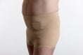 Load image into Gallery viewer, Male Model wearing Suportx Breathable Briefs - An Ostomy underwear designed to provide the funcationality of an ostomy belt within the shape of an underwear. 
